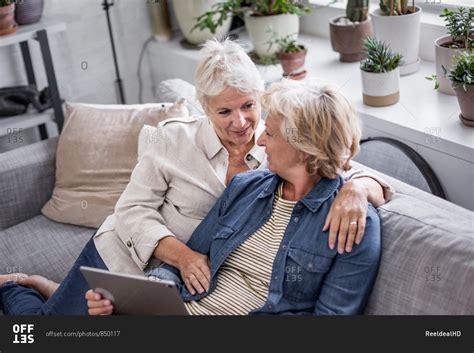 mature lesbienne|Mature lesbian couple at home on sofa Stock Video.